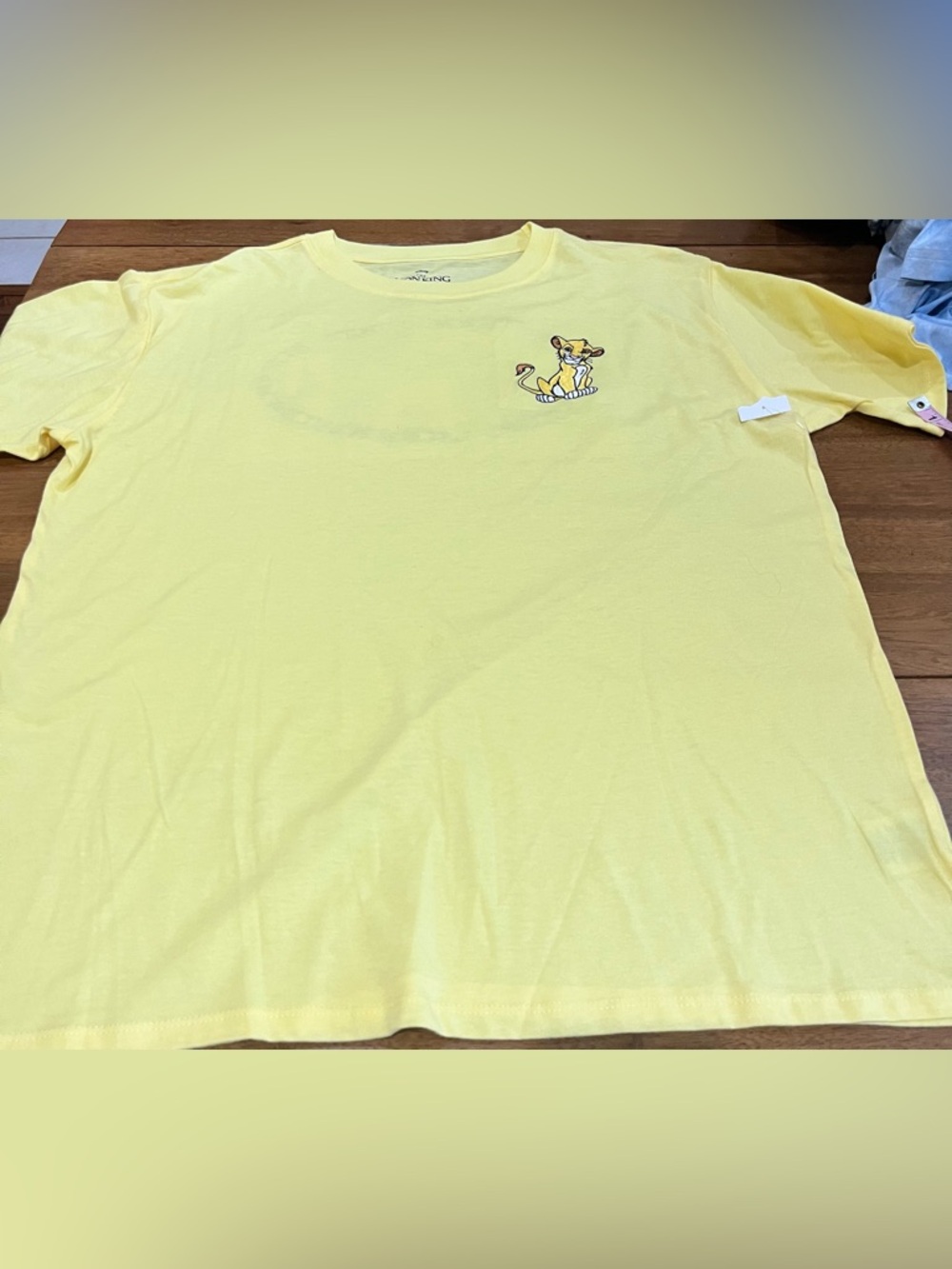 Disney Lion King Yellow Tee with Embroidered Lion Cub on front & Graphic on Back